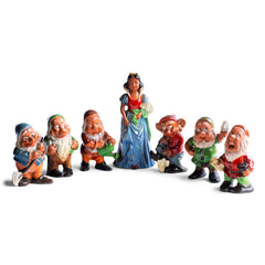 A rare set of vintage 1930s ceramic Snow White and the severn dwarves, beautifully modelled on the animated Disney film first shown in December 1937.  The figures are cold-painted terracotta and are in their original enamel paint, and were made around the time of the Disney film release.
