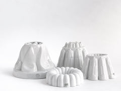 A collection of four vintage 1920s ironstone Shelley jelly moulds.