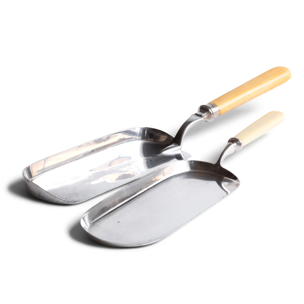 Edwardian silver-plated crumb trays with ivorine handles