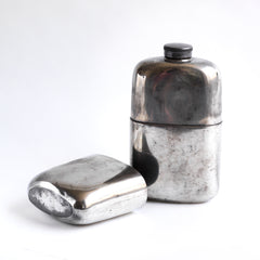 A good-looking Edwardian silver plated hip flask with a screw-cap top by "James Dickson & Sons Sheffield".  This one is super-large and has a particularly striking pared-back design. The upper half has a detachable silver plated EPNS cover that also acts as a cup.