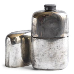 A good-looking Edwardian silver plated hip flask with a screw-cap top by "James Dickson & Sons Sheffield".  This one is super-large and has a particularly striking pared-back design. The upper half has a detachable silver plated EPNS cover that also acts as a cup.