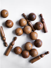 A collection of beautifully made antique numbered balls and skittles, each hand crafted from polished boxwood, and each a beautiful example of late 19th century treen.