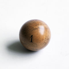A collection of beautifully made antique numbered balls and skittles, each hand crafted from polished boxwood, and each a beautiful example of late 19th century treen.