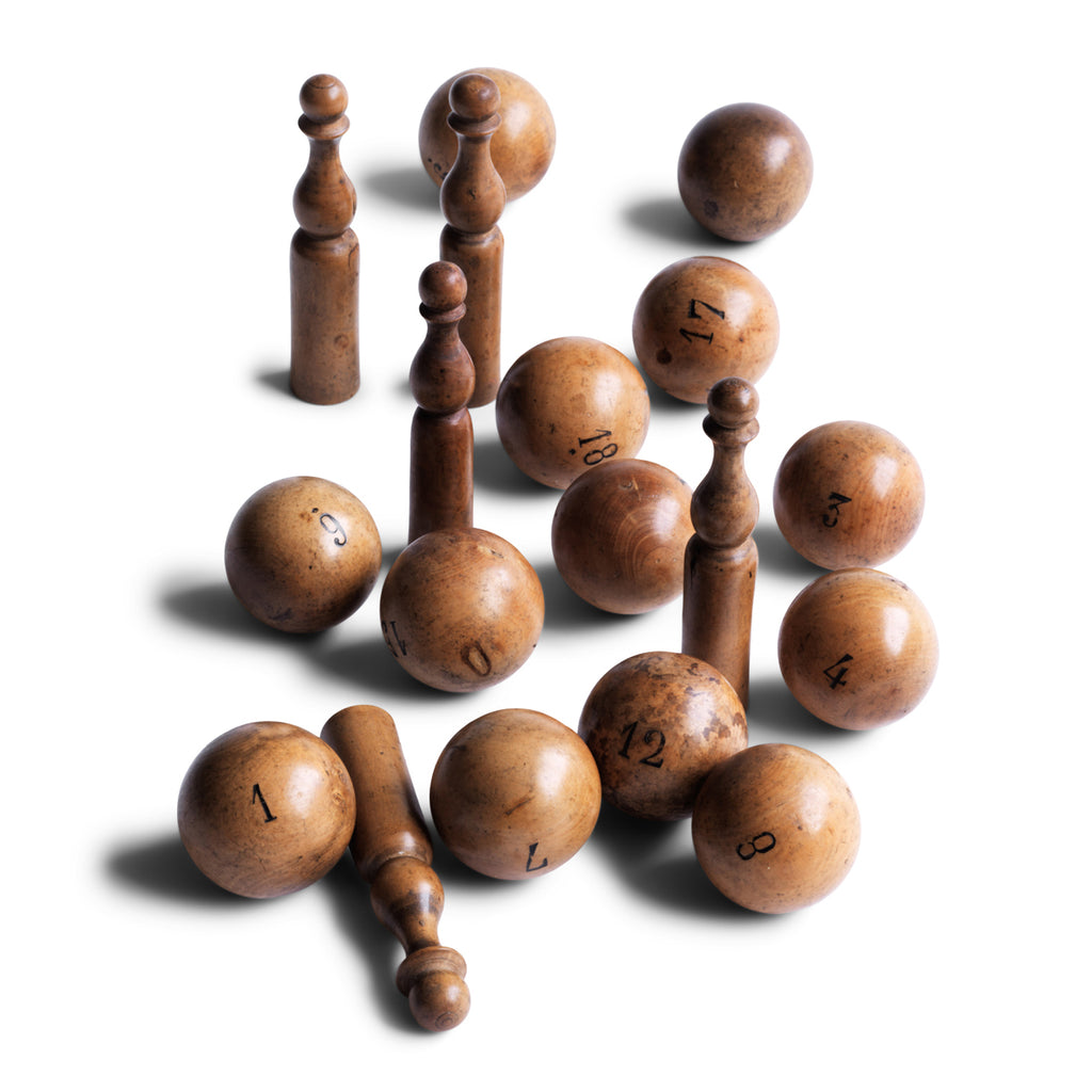 A collection of beautifully made antique numbered balls and skittles, each hand crafted from polished boxwood, and each a beautiful example of late 19th century treen.