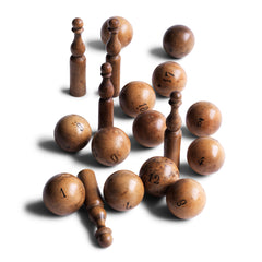 A collection of beautifully made antique numbered balls and skittles, each hand crafted from polished boxwood, and each a beautiful example of late 19th century treen.