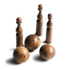A collection of beautifully made antique numbered balls and skittles, each hand crafted from polished boxwood, and each a beautiful example of late 19th century treen.