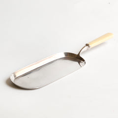 Edwardian silver-plated crumb tray with ivorine handle
