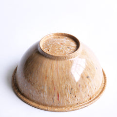 A glorious 1930s American Bakelite fruit bowl of butterscotch splatter pattern, and an excellent example of early twentieth century Modernism. The base is marked "A 118 USA".