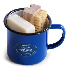 A nail brush and a bar of our utility soap all neatly tucked into our blue enamel mug makes for a thoroughly useful gift. The mug is ideal for holding your toothbrush and toothpaste - or for that night-time drink of water - and will make a smart addition to your bathroom.