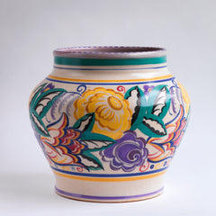 A large 1930s Art Deco geometric floral vase by Carter, Stabler & Adams, Poole Pottery in the HQ pattern, vase shape 627. Hand painted by Poole paintress Anne Hatchard, the geometric flowers and leaves are rich in colour and beautifully executed.