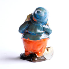 Back view of one of the seven dwarves, from a very fine and rare set of vintage 1930s ceramic Snow White And The Seven Dwarves, beautifully modelled on the animated Disney film first shown in December 1937. The figures are cold-painted terracotta and are in their original enamel paint, and were made around the time of the Disney film release.
