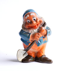 One of the seven dwarves, from a very fine and rare set of vintage 1930s ceramic Snow White And The Seven Dwarves, beautifully modelled on the animated Disney film first shown in December 1937. The figures are cold-painted terracotta and are in their original enamel paint, and were made around the time of the Disney film release.