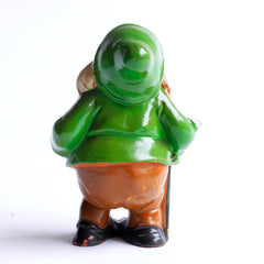 Back view of one of the seven dwarves, from a very fine and rare set of vintage 1930s ceramic Snow White And The Seven Dwarves, beautifully modelled on the animated Disney film first shown in December 1937. The figures are cold-painted terracotta and are in their original enamel paint, and were made around the time of the Disney film release.