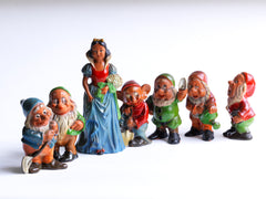 A very fine and rare set of vintage 1930s ceramic Snow White and the severn dwarves, beautifully modelled on the animated Disney film first shown in December 1937.  The figures are cold-painted terracotta and are in their original enamel paint, and were made around the time of the Disney film release.