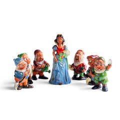 A very fine and rare set of vintage 1930s ceramic Snow White and the severn dwarves, beautifully modelled on the animated Disney film first shown in December 1937.  The figures are cold-painted terracotta and are in their original enamel paint, and were made around the time of the Disney film release.