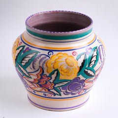 A large 1930s Art Deco geometric floral vase by Carter, Stabler & Adams, Poole Pottery in the HQ pattern, vase shape 627. Hand painted by Poole paintress Anne Hatchard, the geometric flowers and leaves are rich in colour and beautifully executed.