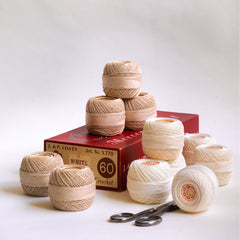 Original vintage spools of Coats crochet cotton thread by J & P Coats. Each spool contains a paper label printed with "Mercer Crochet 20g net".