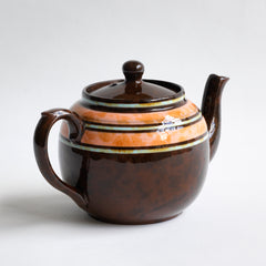 A very pretty 1930s 2 - 3 cup original Brown Betty teapot with peach, butterscotch and sky-blue marbled banding.