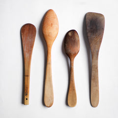 A collection of vintage wooden cooking spoons and spatulas that once belonged to Julia Lane, the wife of artist Howard Hodgkin.