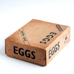 Part of a collection of charming 1940s World War II home front egg postal boxes. The lids, end panels and/or front panels are all stencilled "Eggs". They would have been used to post eggs from the farm to the customer during WWII.