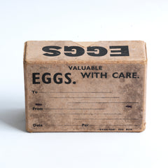 Part of a collection of charming 1940s World War II home front egg postal boxes. The lids, end panels and/or front panels are all stencilled "Eggs". They would have been used to post eggs from the farm to the customer during WWII.