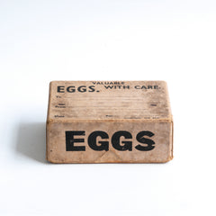 Part of a collection of charming 1940s World War II home front egg postal boxes. The lids, end panels and/or front panels are all stencilled "Eggs". They would have been used to post eggs from the farm to the customer during WWII.
