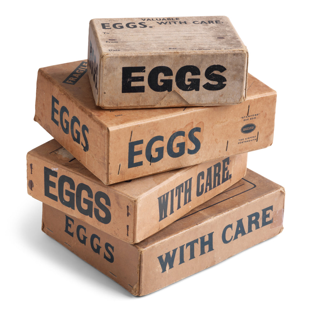 A collection of charming 1940s World War II home front egg postal boxes. The lids, end panels and/or front panels are all stencilled "Eggs". They would have been used to post eggs from the farm to the customer during WWII.