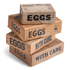A collection of charming 1940s World War II home front egg postal boxes. The lids, end panels and/or front panels are all stencilled "Eggs". They would have been used to post eggs from the farm to the customer during WWII.
