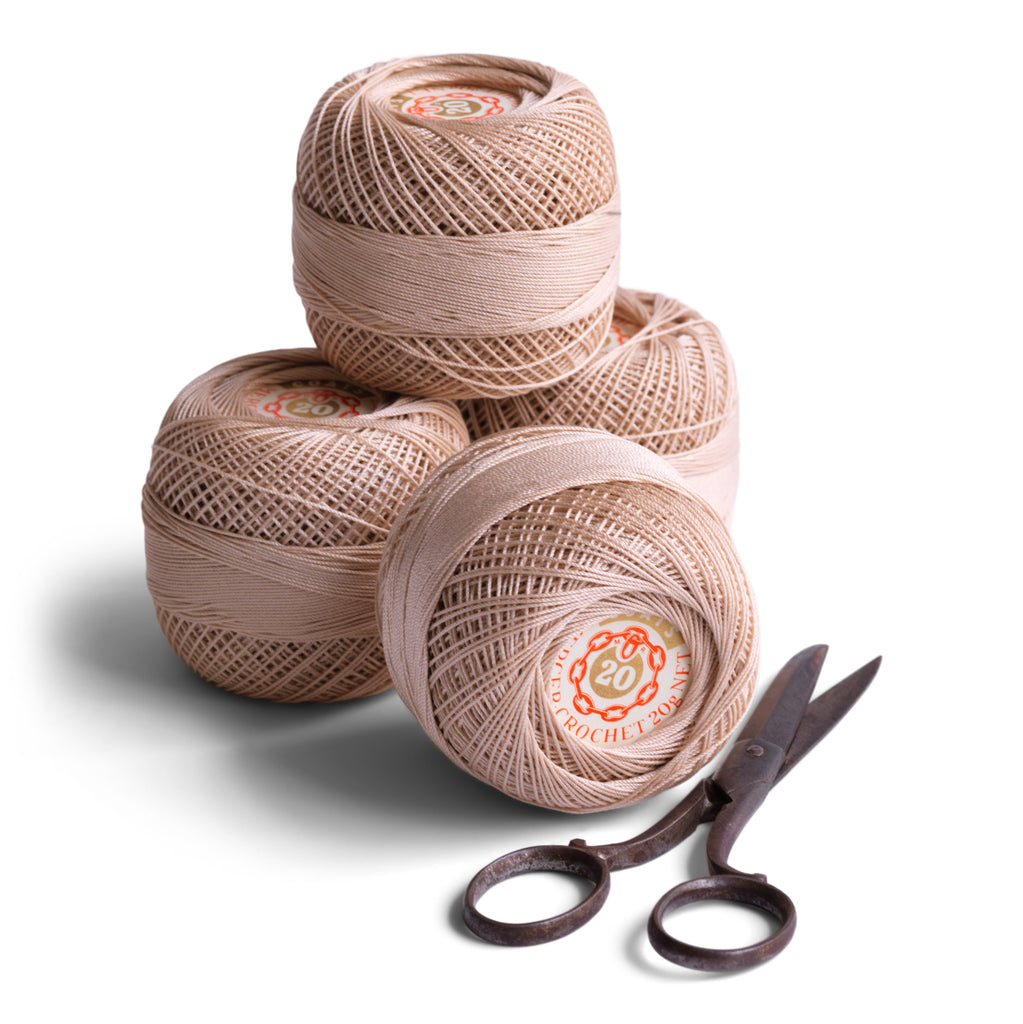 Original vintage spools of Coats crochet cotton thread by J & P Coats. Each spool contains a paper label printed with "Mercer Crochet 20g net".