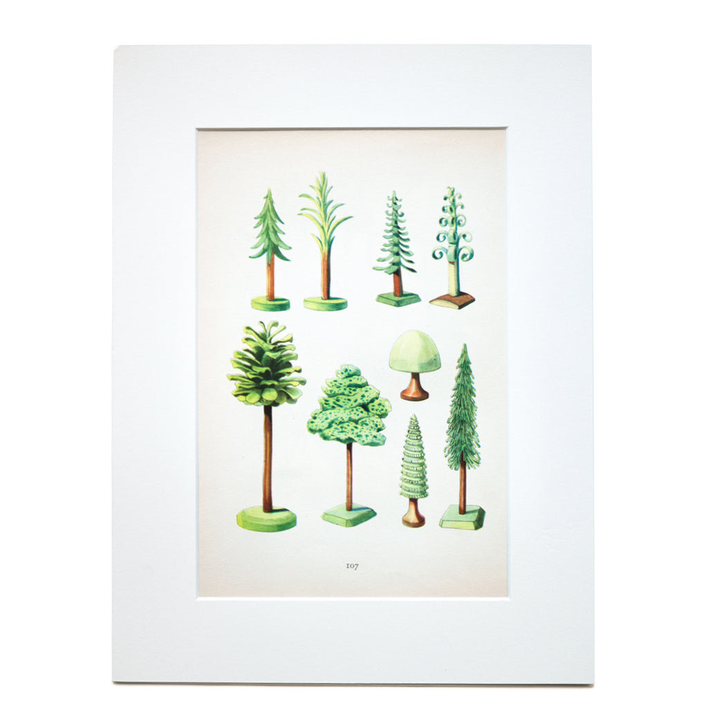 A beautifully illustrated study of toy trees from Czechoslovak “Folk Toys / Les Jouets Populaires”, a hand-blocked print from a book by Emanuel Hercik containing illustrations by Emanuel Hercik and Oldrich Menhart of folk toys from around the world, printed in 1951. The print is mounted within a thick card border.