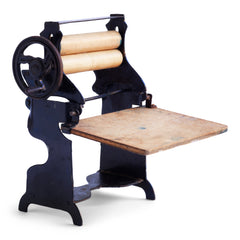 A charming Edwardian miniature doll's house mangle.