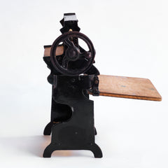 A charming Edwardian miniature doll's house mangle.