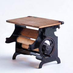 A charming Edwardian miniature doll's house mangle.