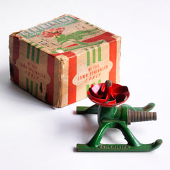 A 1930s 12/- "Gentribine" lawn sprinkler, "British Made" stamped into the iron base. The sprinkler is in full working order and only requires attaching to the end of a garden hose - once turned on, the water pressure causes the sprinkler to spin round, the jets watering the garden in an even circle.