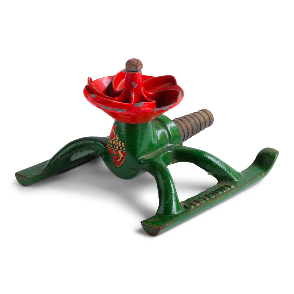 A 1930s 12/- "Centribine" lawn sprinkler, "British Made" stamped into the iron base. The sprinkler is in full working order and only requires attaching to the end of a garden hose - once turned on, the water pressure causes the sprinkler to spin round, the jets watering the garden in an even circle.