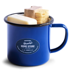 A nail brush and a bar of our utility soap all neatly tucked into our blue enamel mug makes for a thoroughly useful gift. The mug is ideal for holding your toothbrush and toothpaste - or for that night-time drink of water - and will make a smart addition to your bathroom.