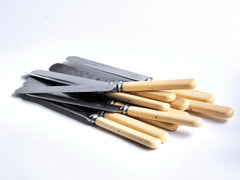 A very good set of early twentieth century carbon steel blade flatware. Each blade thread is pinned through the handle and is marked "Fine steel Marrison Fisher & Co Sheffield". Carbon steel provides the best cutting edge, and the blades can also be sharpened.
