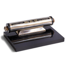 A super-cool 1930s chromium plated perpetual calendar mounted on a black perspex base. The months are adjusted by swivelling the black Bakelite discs either end, and the date is changed by turning the chrome knobs. A clever piece of kit, and the smartest way of keeping today's date and month on your desk.