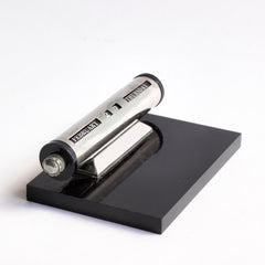 A super-cool 1930s chromium plated perpetual calendar mounted on a black perspex base. The months are adjusted by swivelling the black Bakelite discs either end, and the date is changed by turning the chrome knobs. A clever piece of kit, and the smartest way of keeping today's date and month on your desk.