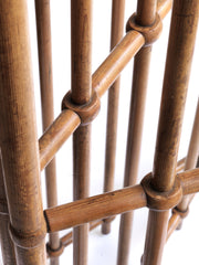 Detail of a particularly fine Arts & Crafts gated wooden screen consisting of three open panels.  Each panel is constructed from turned wooden spindles that pass through wooden crossbars - the whole resembling railings. Each spindle is topped with a turned acorn-shaped finial. The execution of the joinery and the pared-back design is pure Arts & Crafts.