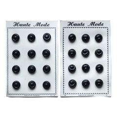 We have several of these "Haute Mode" black buttons mounted on their original sales card. Each circular button is shaped like a mini bread roll and there are 12 in total on each card.