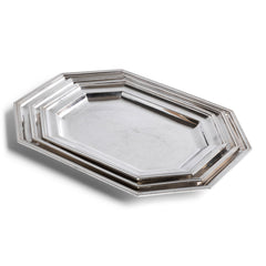 A magnificent set of three graduated silver-plated hotel ware silver platters with raised picture-frame borders and chamfered corners. Each is stamped on the underside "Unity A1 Plate Made in England". Well-proportioned, with a good weight, and beautifully designed, they are a joy to use and are the making of a good meal - and would make a stylish addition on today’s table.  Splendid for that Christmas turkey or goose.