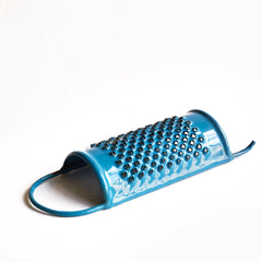 A miniature kitchen cheese grater, part of an extensive collection of pale blue enamel miniature antique kitchen ware, previously owned by the miniaturist specialist and collector extraordinaire Joan Dunk; including, flour scoops, sieve, ewer, grater, saucepan, frying pan and a funnel.