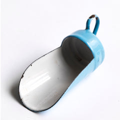 A miniature enamel flour scoop, part of an extensive collection of pale blue enamel miniature antique kitchen ware, previously owned by the miniaturist specialist and collector extraordinaire Joan Dunk; including, flour scoops, sieve, ewer, grater, saucepan, frying pan and a funnel.