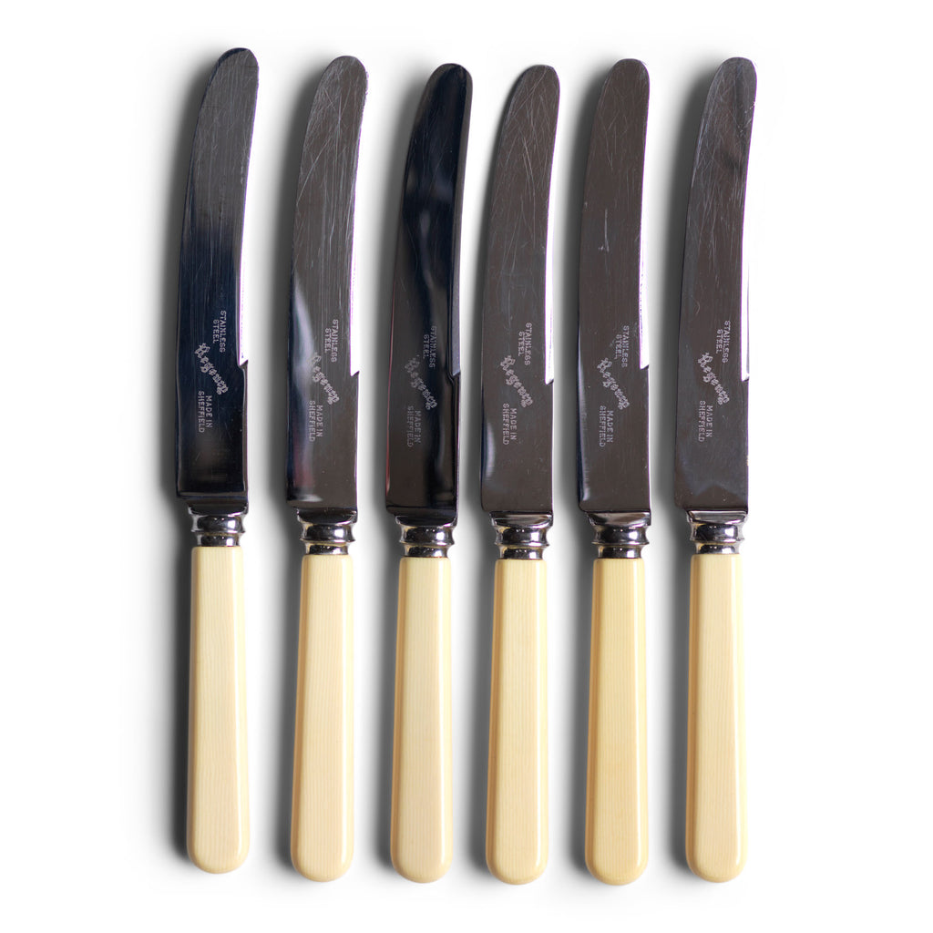A set of 6 vintage "bone handle knives", each blade marked "Regency Sheffield".