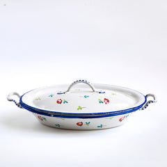 A wonderful, rare antique doll's enamel dinner service decorated with rose buds and leaf sprigs, and each piece finished with a blue trim; very much in tune with the current trend "cottage core", an aesthetic which celebrates an idealised rural life. This is part of an extensive collection of miniature enamel kitchen ware, previously owned by the late miniaturist specialist and collector extraordinaire Joan Dunk.