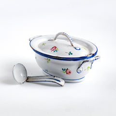 A wonderful, rare antique doll's enamel dinner service decorated with rose buds and leaf sprigs, and each piece finished with a blue trim; very much in tune with the current trend "cottage core", an aesthetic which celebrates an idealised rural life. This is part of an extensive collection of miniature enamel kitchen ware, previously owned by the late miniaturist specialist and collector extraordinaire Joan Dunk.
