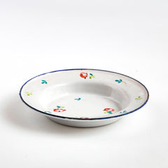 A wonderful, rare antique doll's enamel dinner service decorated with rose buds and leaf sprigs, and each piece finished with a blue trim; very much in tune with the current trend "cottage core", an aesthetic which celebrates an idealised rural life. This is part of an extensive collection of miniature enamel kitchen ware, previously owned by the late miniaturist specialist and collector extraordinaire Joan Dunk.