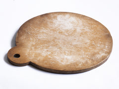 A superb and rare 19th century Welsh sycamore dough board from Carmarthenshire, and a very good example of kitchen treen.