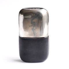 An exceptional Edwardian silver plated, glass and black leather 1/2 pint hip flask with a screw-cap top by "James Dickson & Sons Sheffield". The clear glass body is half covered with leather, the upper half has a detachable silver plated cover that also acts as a cup.